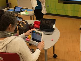 A student doing work on a tablet