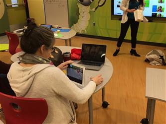 A student doing work on a tablet